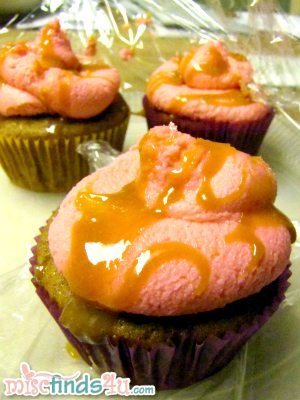 Spice cupcakes with apple pie filling, butter cream frosting, and caramel drizzle