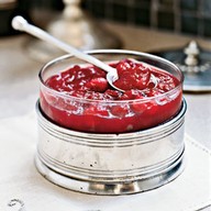 Made with brown sugar, orange juice, honey, allspice - This tangy-sweet homemade cranberry sauce is delicious served with turkey, chicken, quail, duck, or ham.