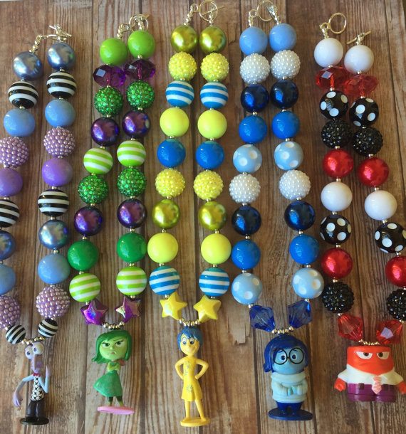 Hand strung INSIDE OUT necklaces that feature Pixar's adorable characters. Matching bracelets are also available. Buy them at PinkBubbleGumBling